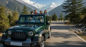 2025 Mahindra Thar Facelift on Indian mountain road with driver